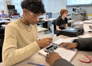 Student works on a circuit