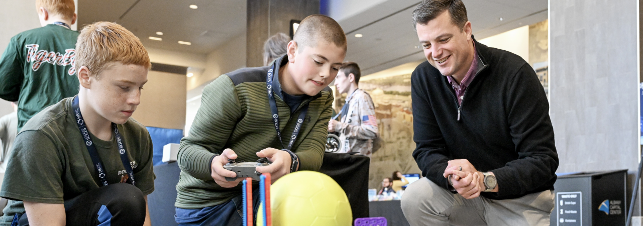 Teachers learn about robotics at a technology training workshop.