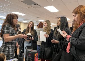 Students meet with a business rep